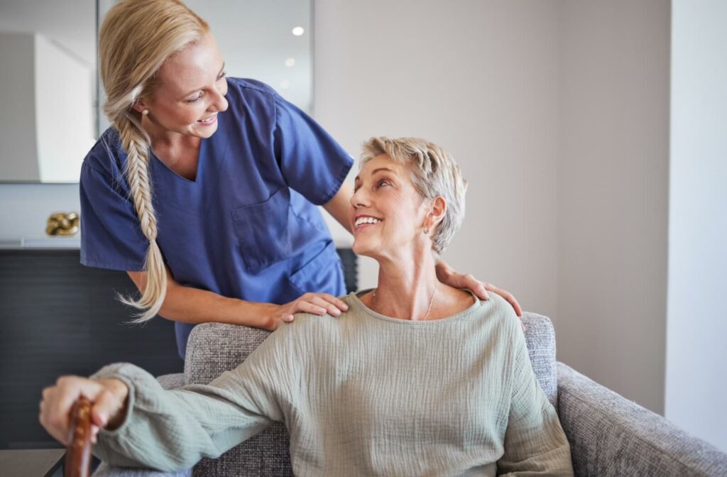 Nurse, healthcare and retirement with a senior woman and carer in a home for health